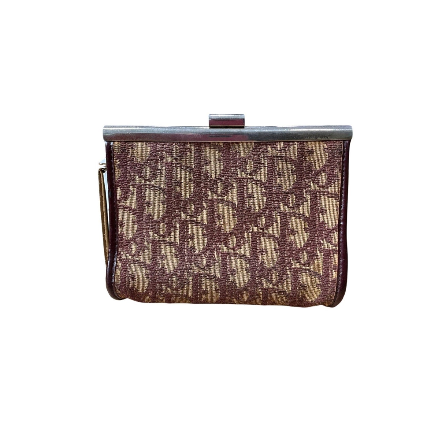 Vintage handbag with monogram pattern on a white background