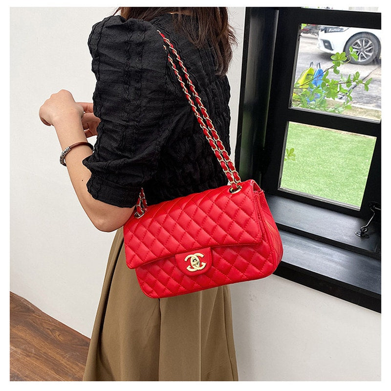Red Chanel style bag