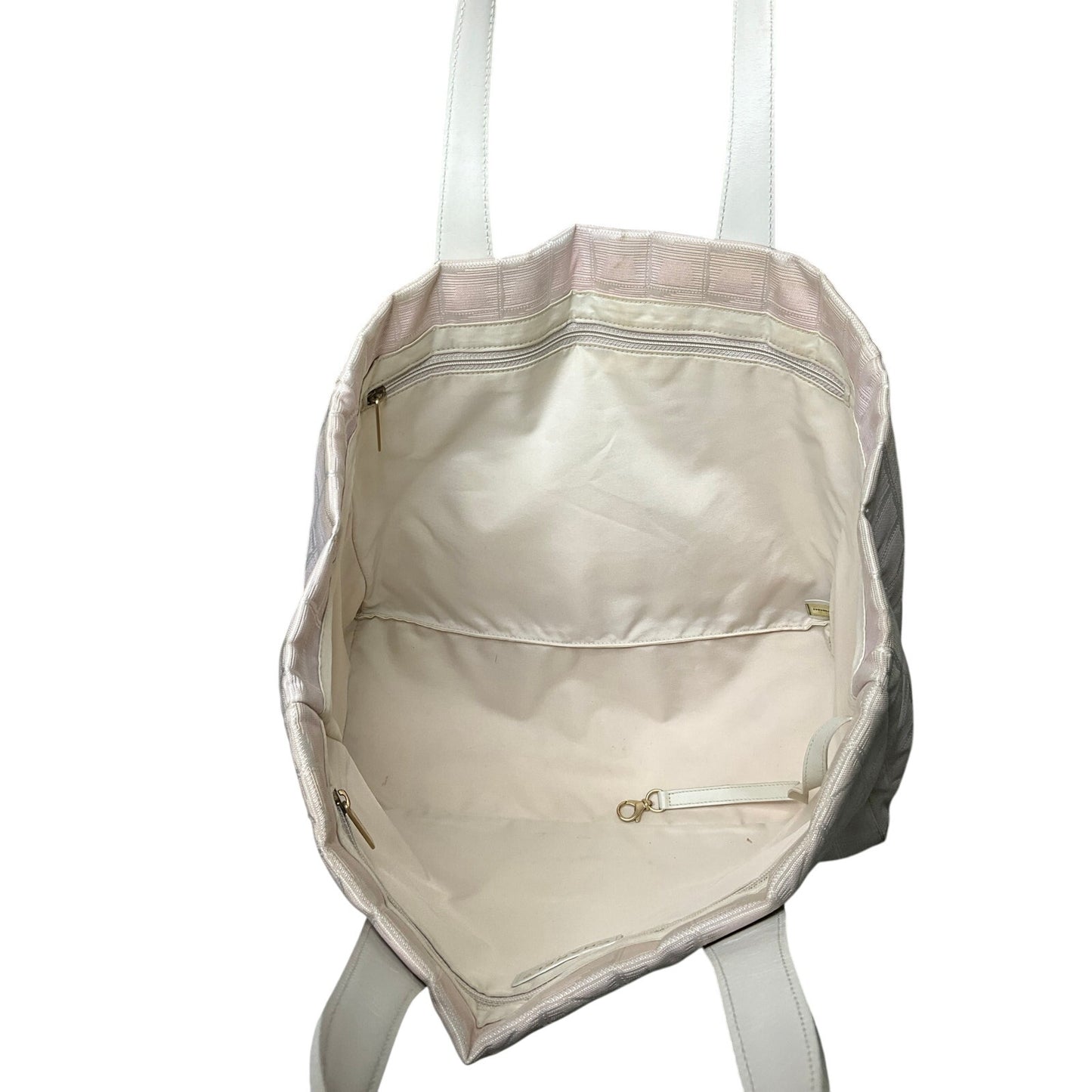 Beige tote bag with shoulder straps on a white background