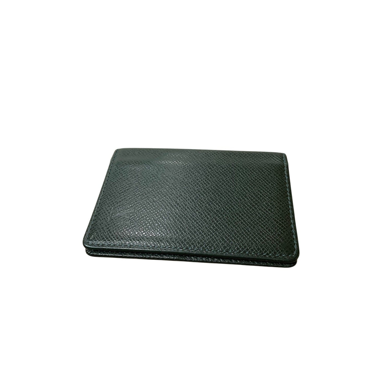 Green leather wallet on a white background