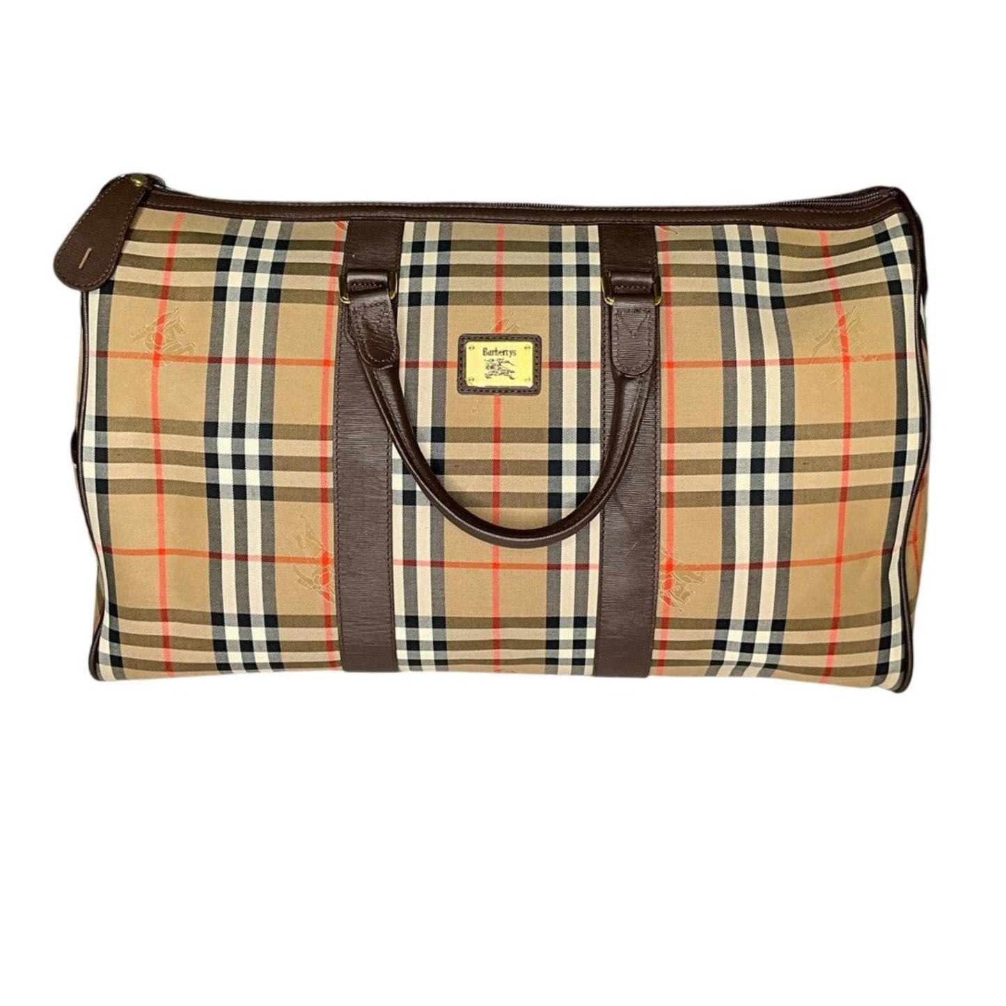 Plaid bag with brown handles on a white background