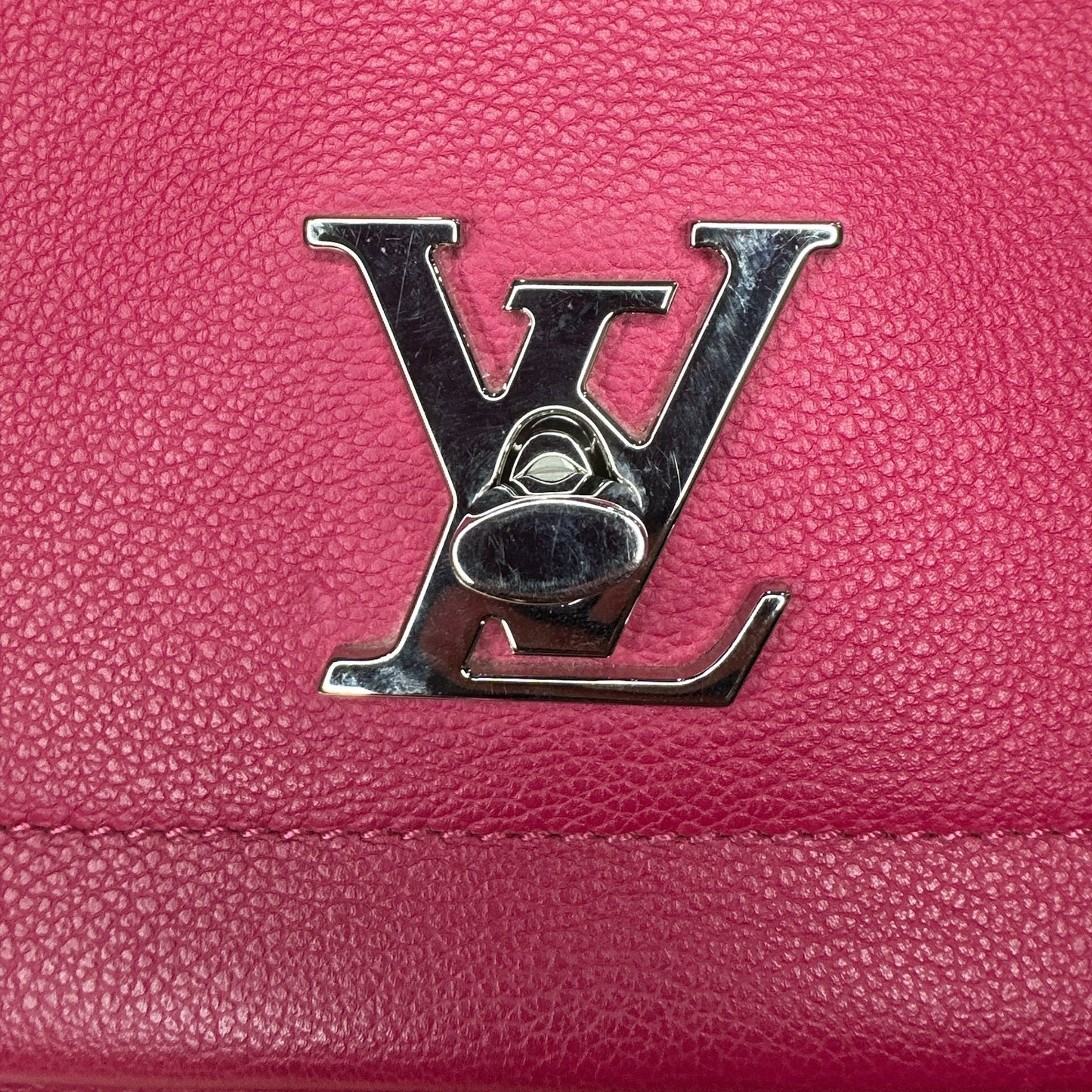 LOUIS VUITTON
Dahlia Calfskin Leather Lockme II - Clairely Amazing