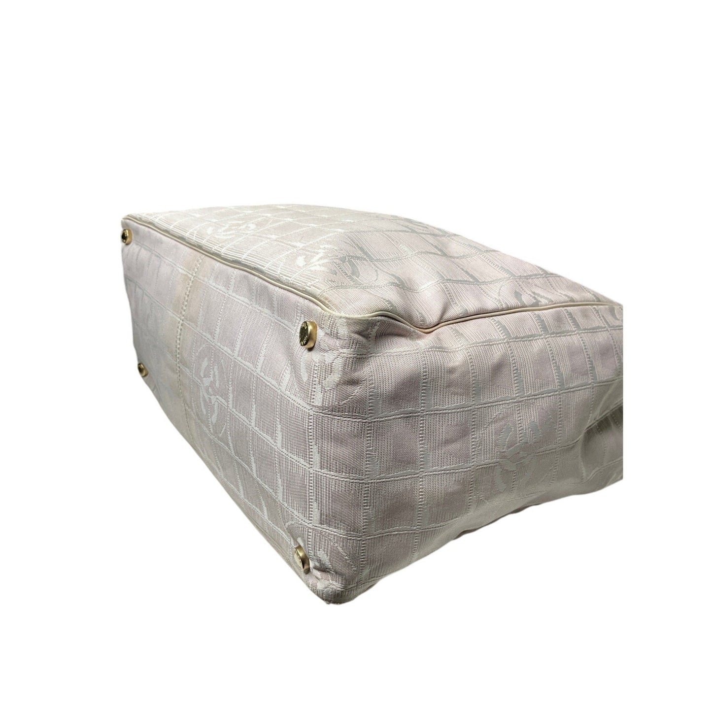 Rectangular ottoman with quilted design on a white background