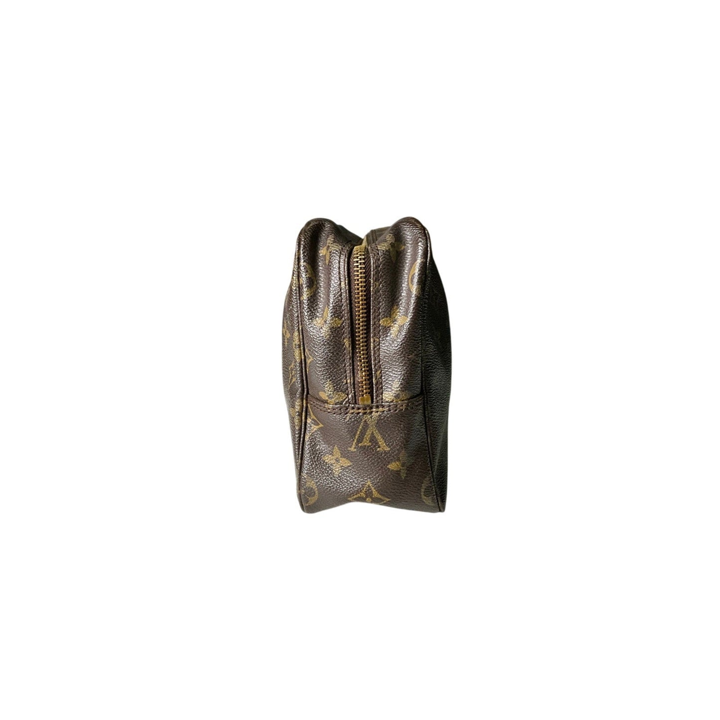 Small pouch with a gold zipper and monogram pattern on a white background