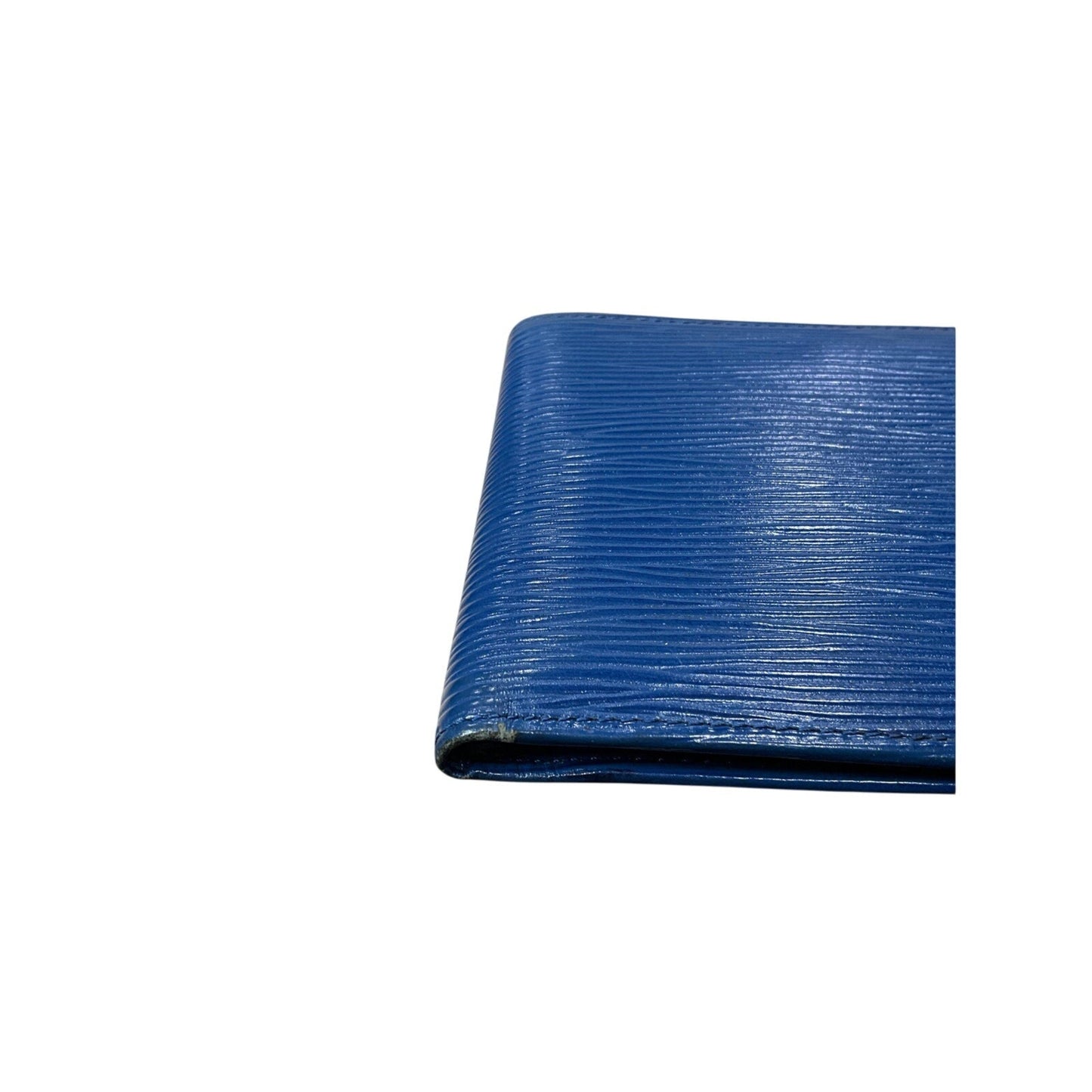Blue textured wallet on a white background