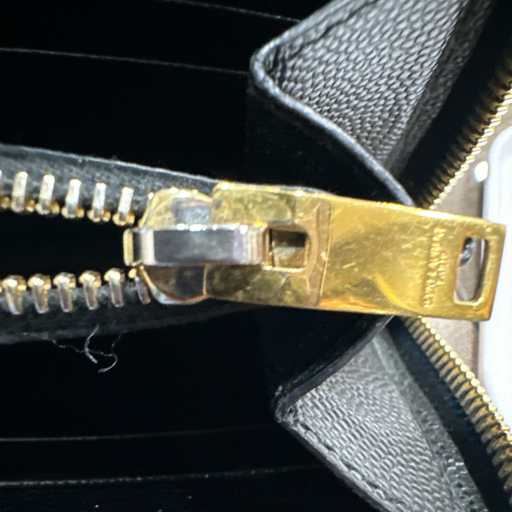 YSL Cassandra Zippy Wallet Black - Clairely Amazing