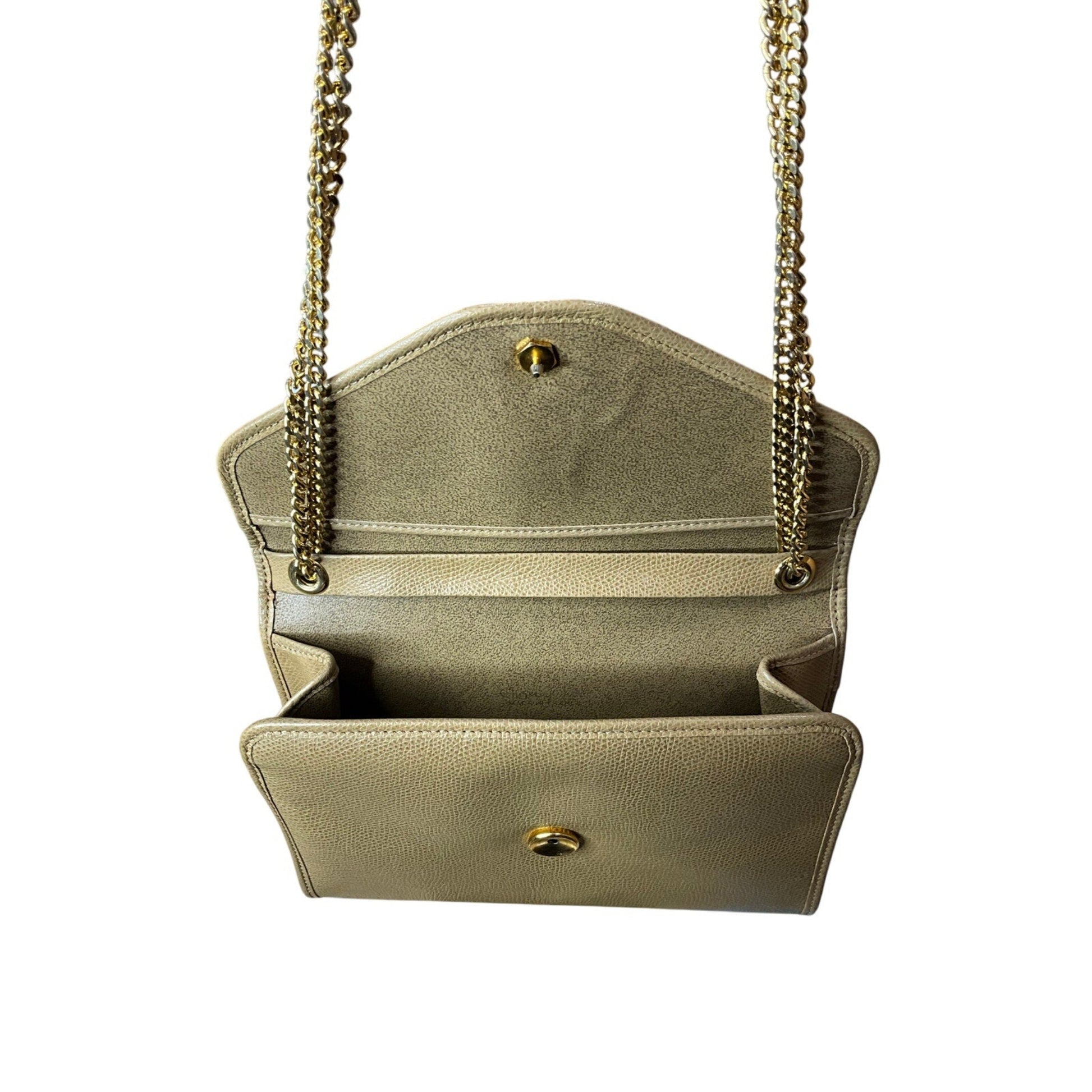 Beige handbag with gold chain strap on a white background