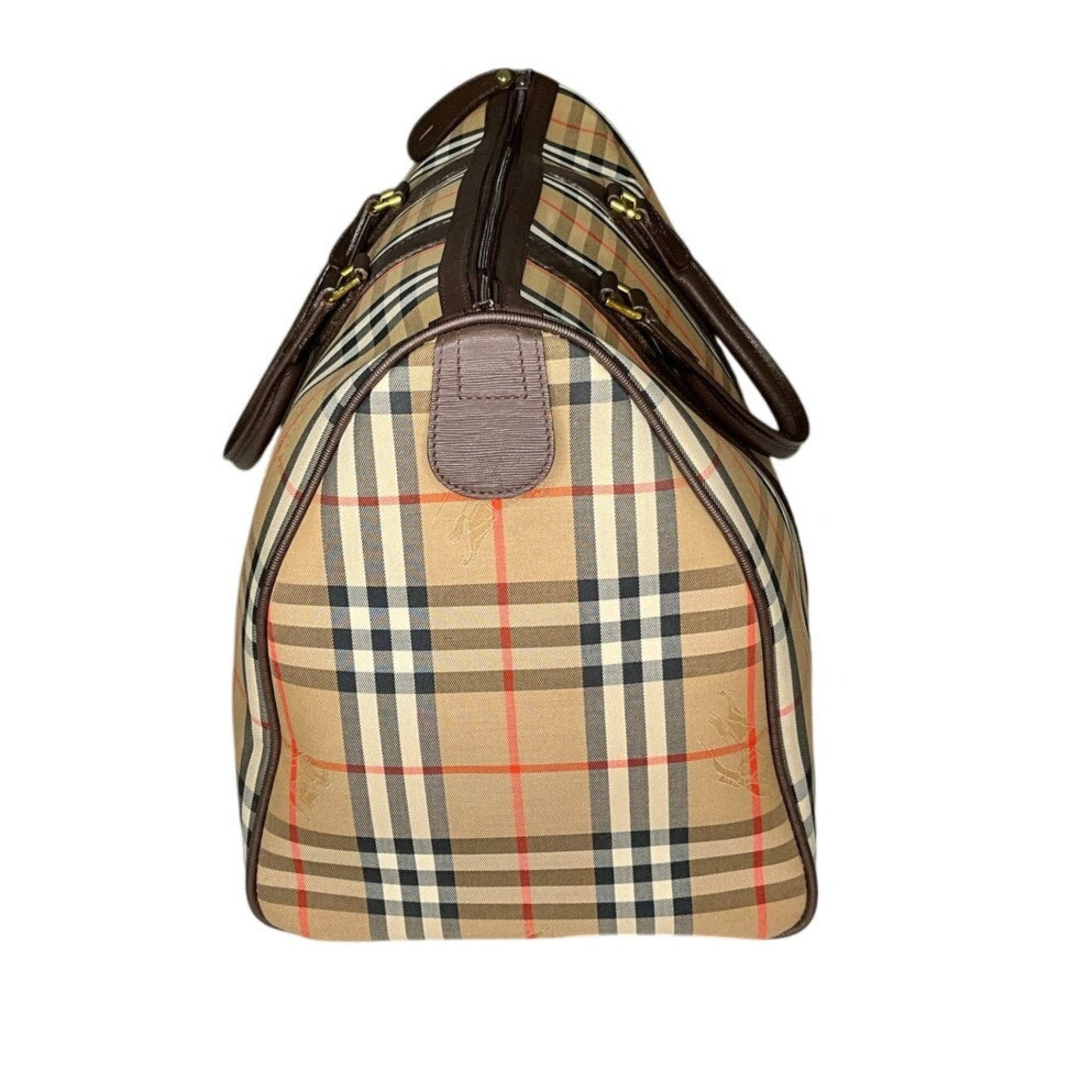 Plaid patterned bag with brown handle on a white background