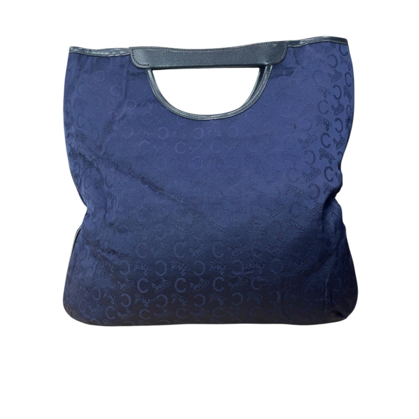 Blue tote bag with circular pattern on a white background