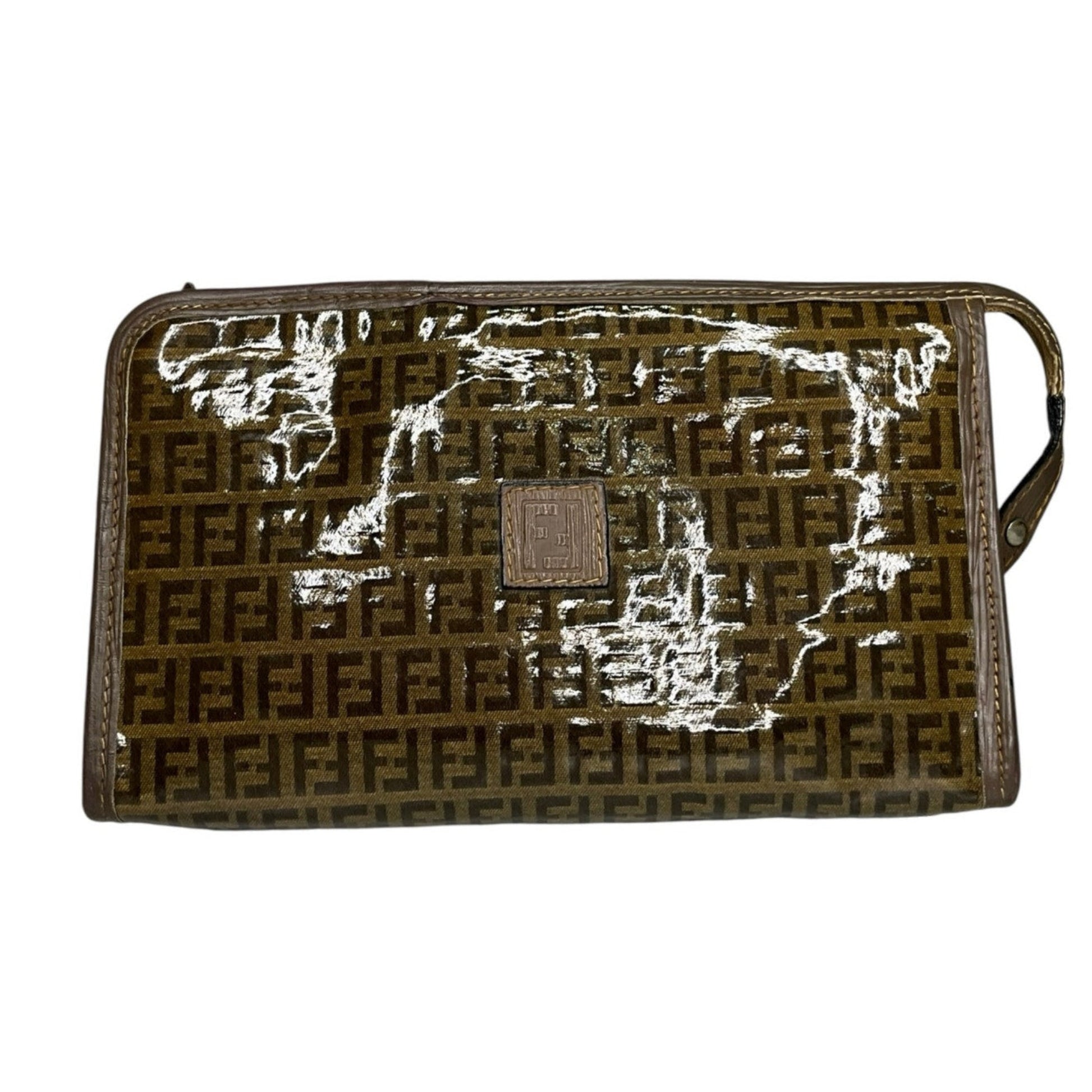 Designer handbag with a prominent logo on a white background
