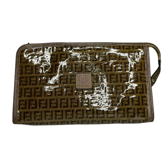 Designer handbag with a prominent logo on a white background