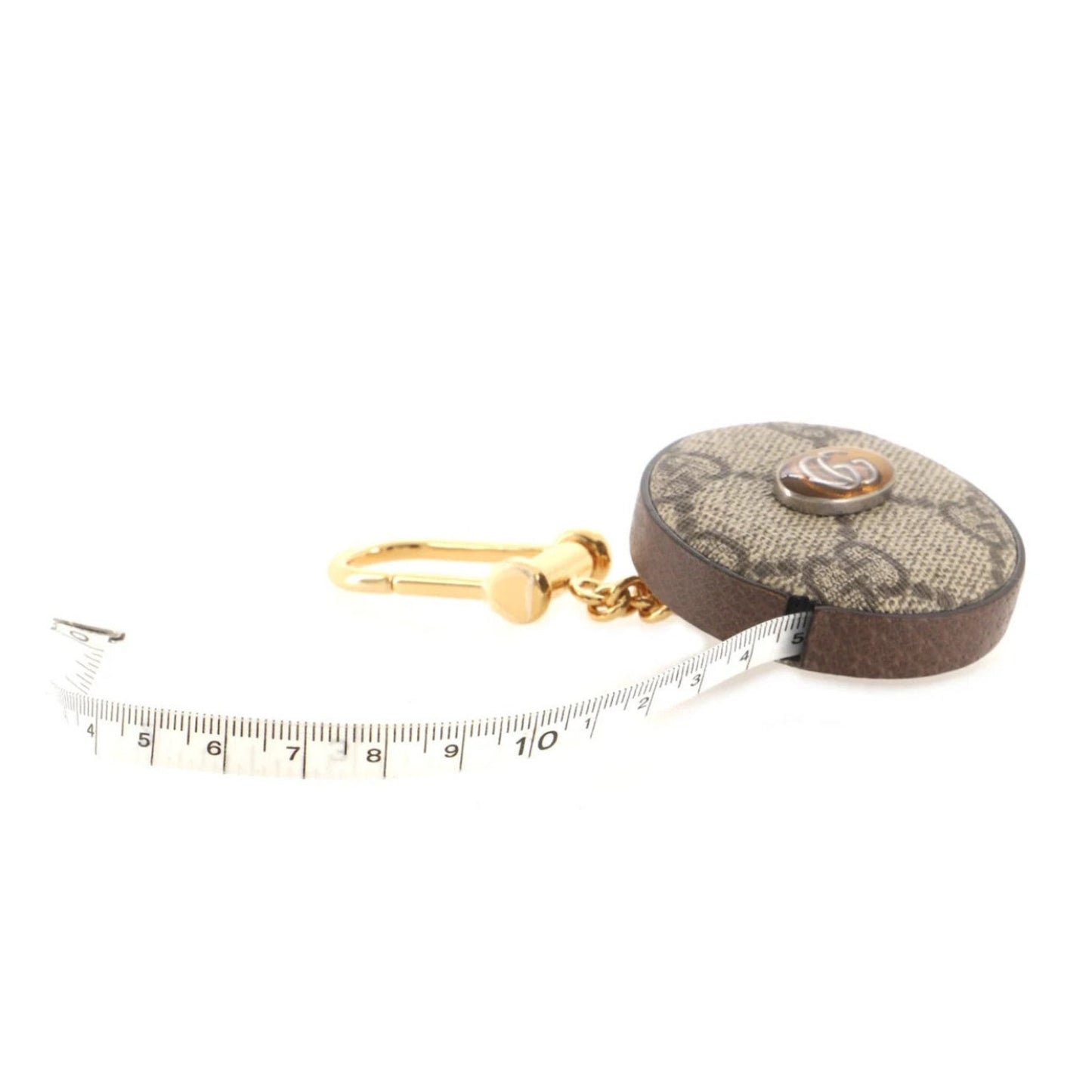 Retractable tape measure with decorative case on a white background