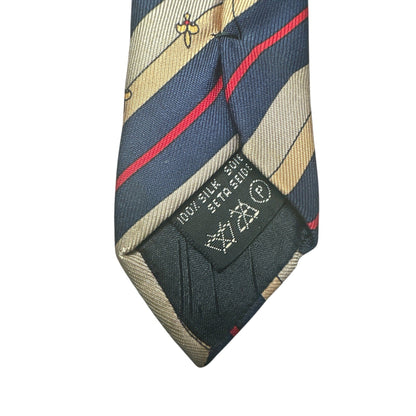 Striped tie with brand label on a white background