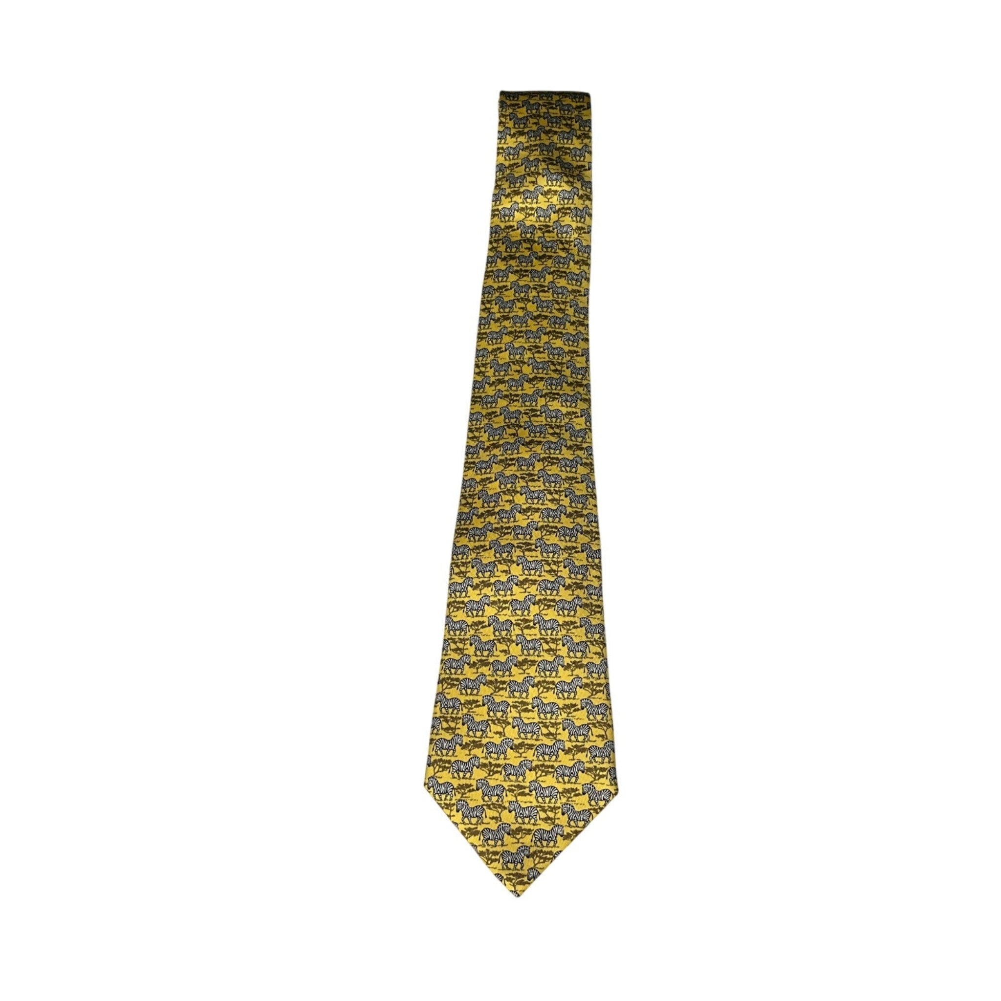 Yellow tie with black pattern on a white background