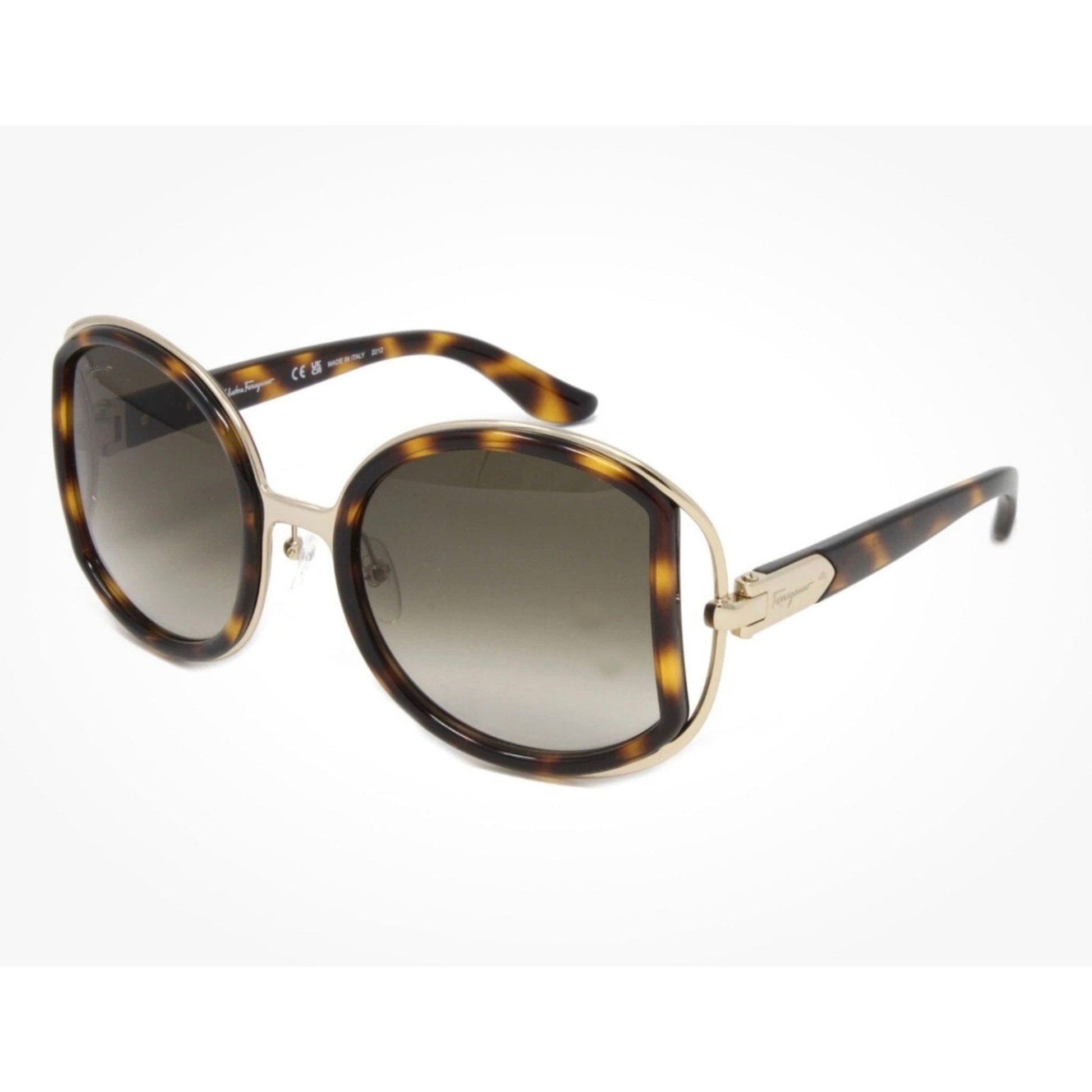 Sunglasses with tortoiseshell frame and gradient lenses on a white background