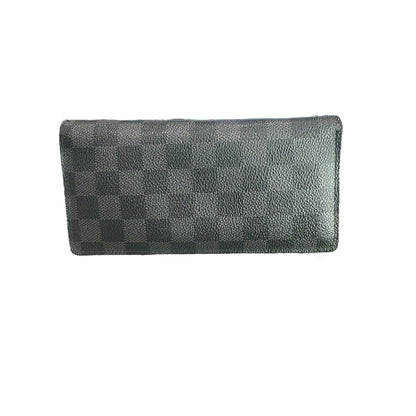 Gray wallet with checkered pattern on a white background