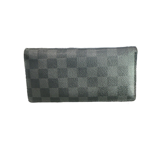 Gray wallet with checkered pattern on a white background