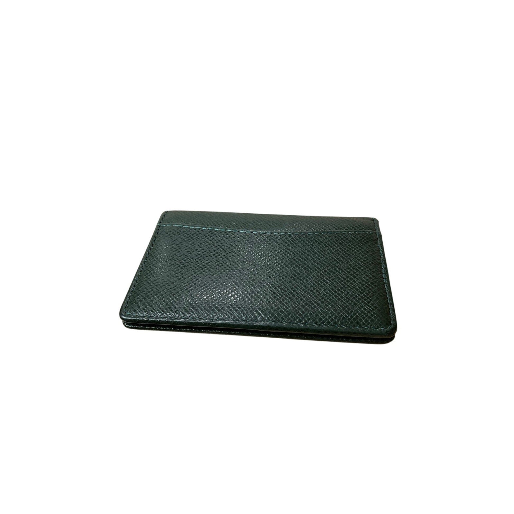 Green leather wallet on a white background