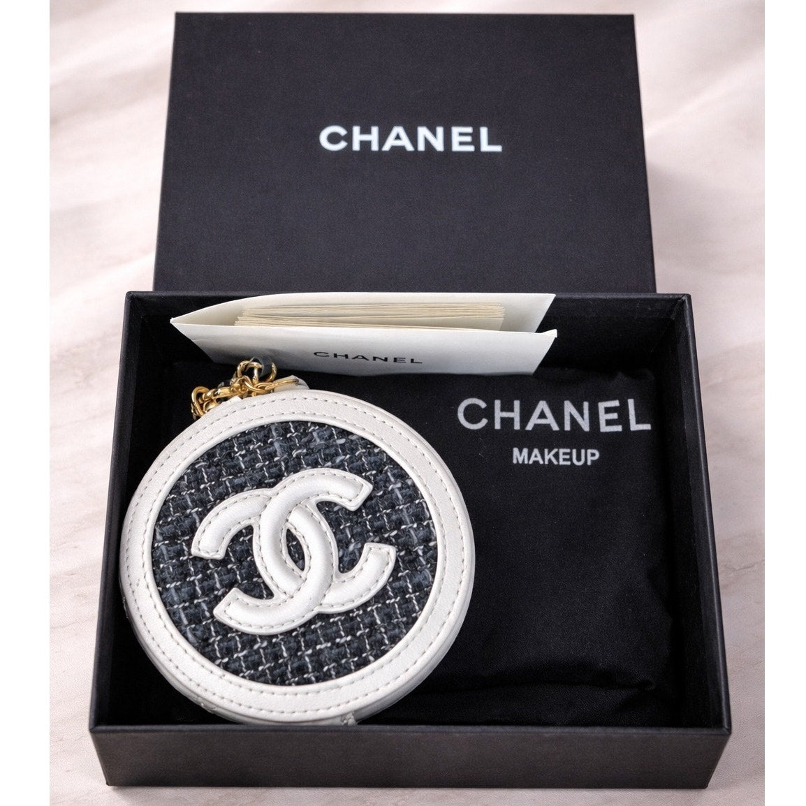 Chanel Makeup Tweed Quilted Round Filigree Pouch With Chain in white and black