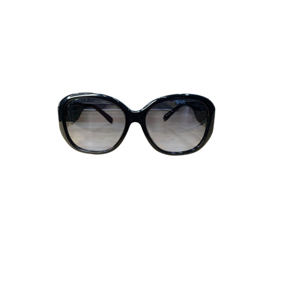 Black sunglasses with reflective lenses on a white background