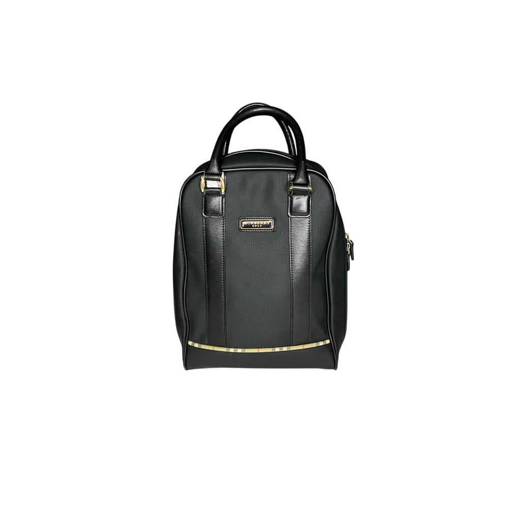 Black backpack with gold accents on a white background