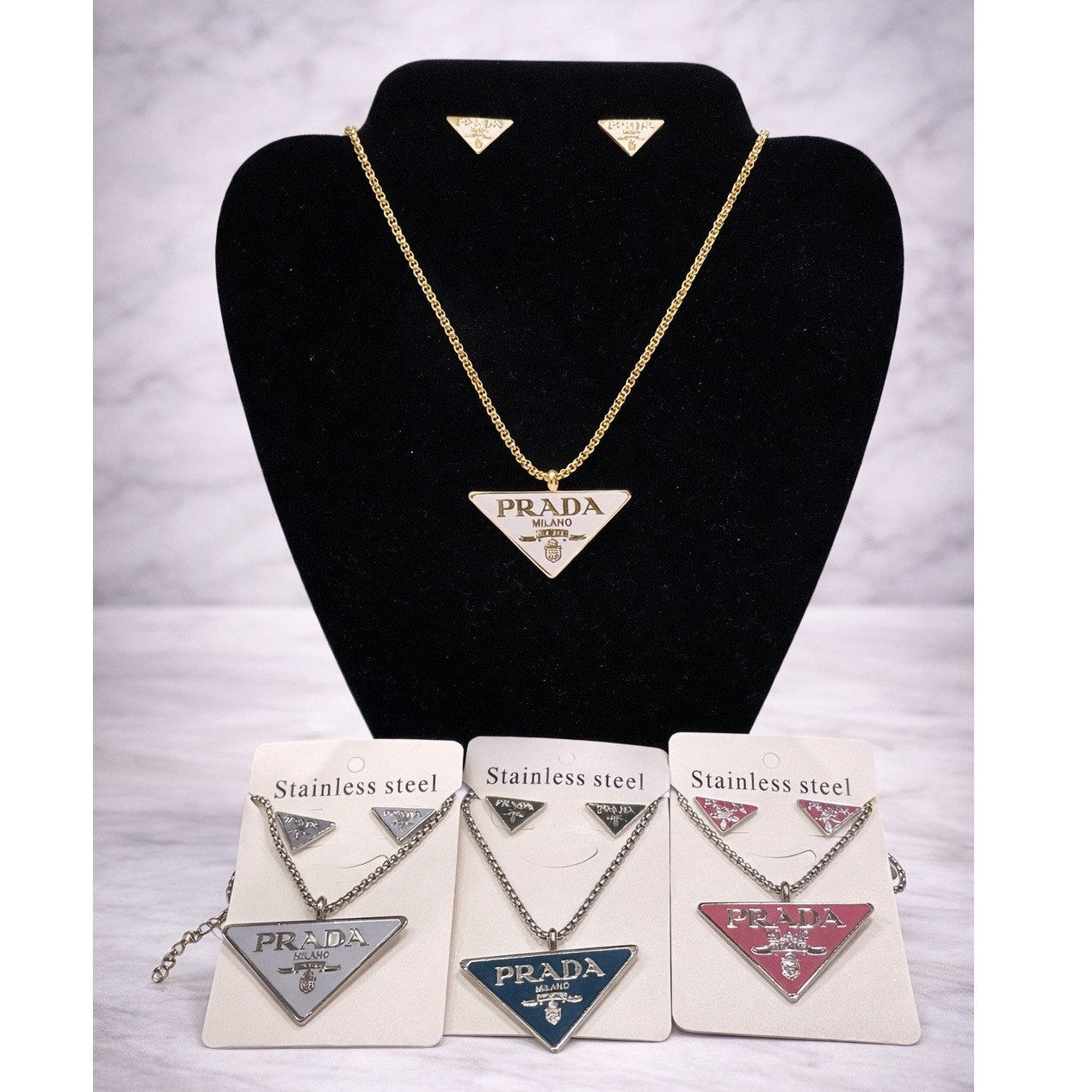 Triangle Logo Pendant Necklace & Stud Earrings Set