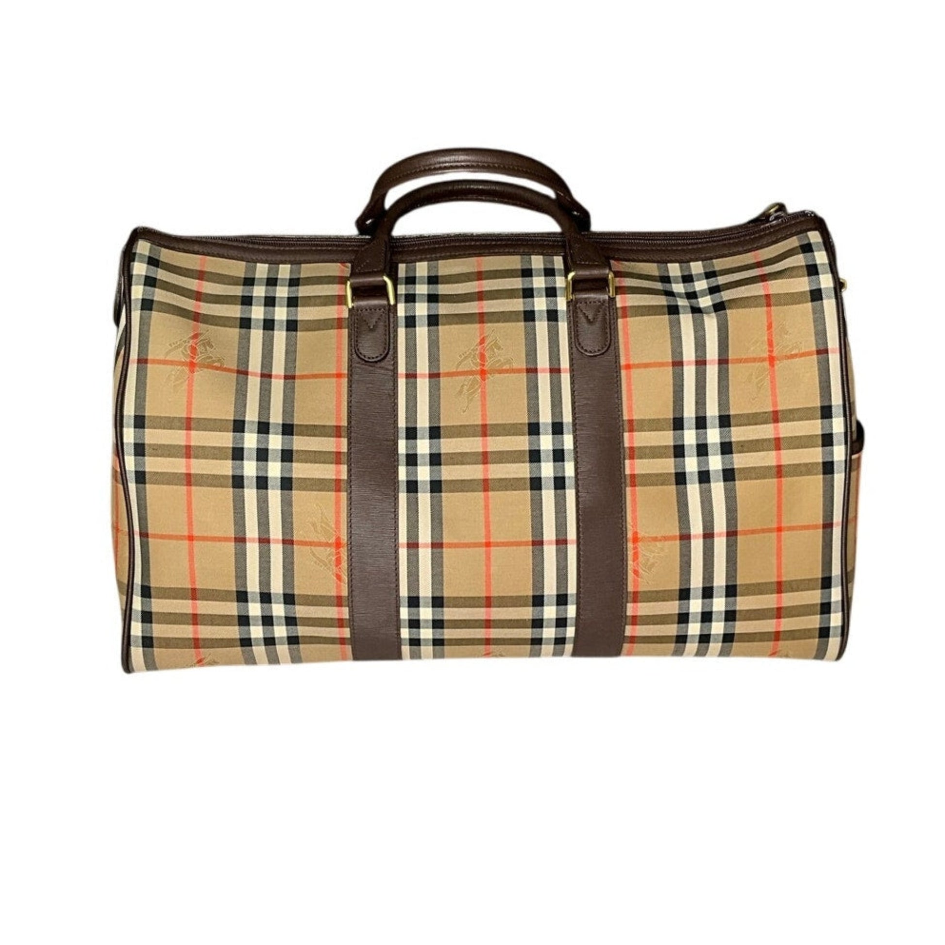 Plaid patterned bag with brown straps on a white background
