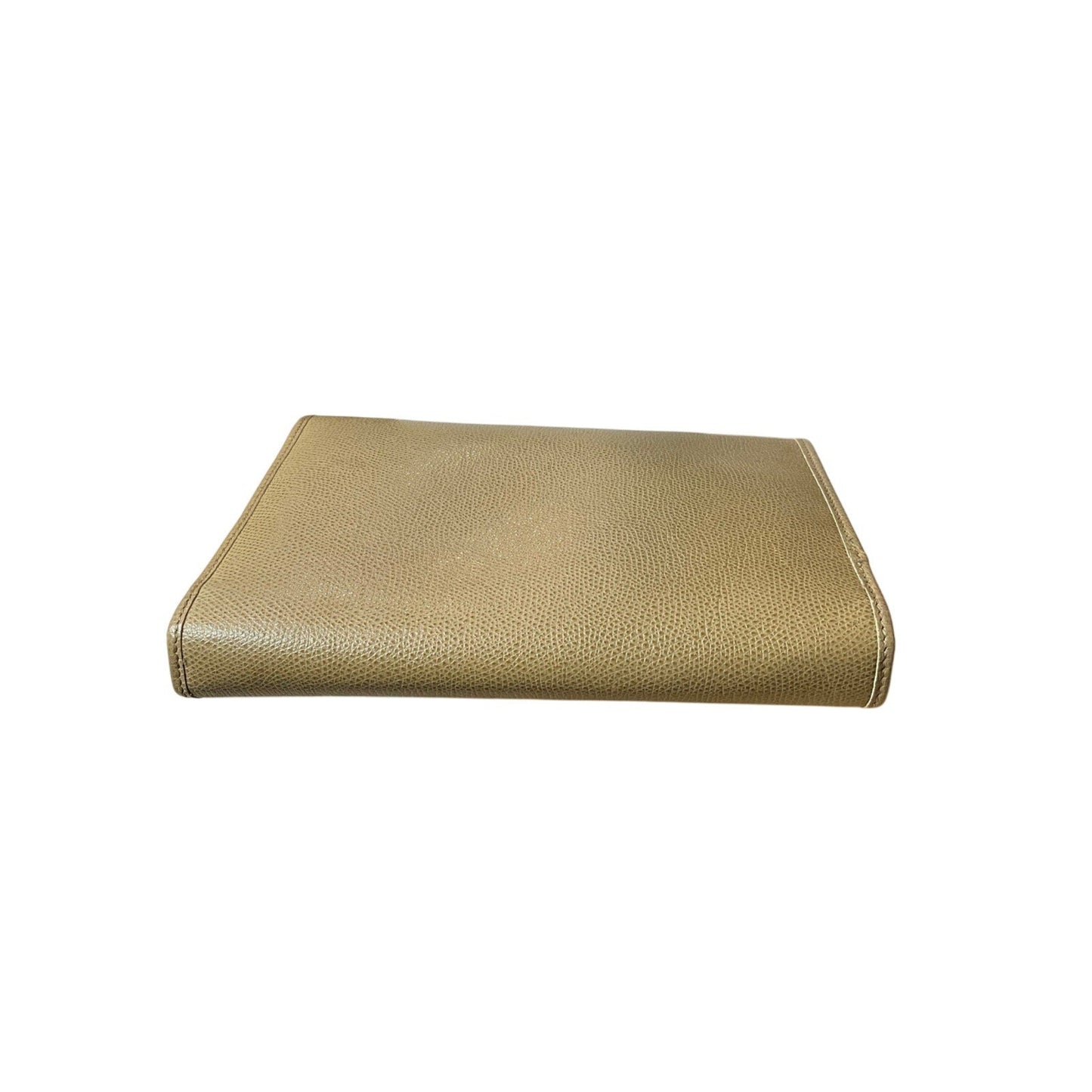 Gold-colored leather wallet on a white background