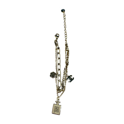 Layered Gold Tone Charm Chain Bracelet