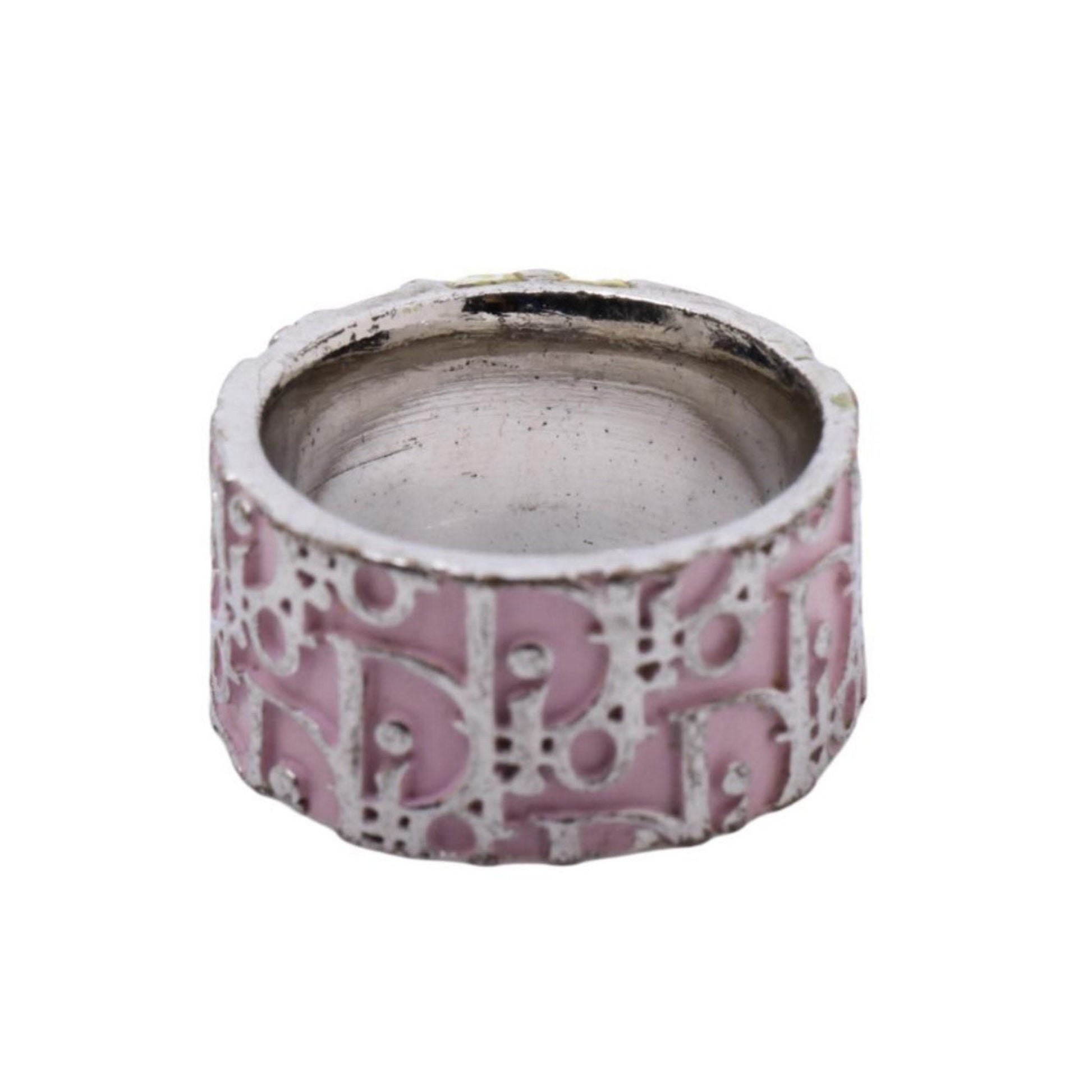 Decorative pink and white ceramic planter on a white background