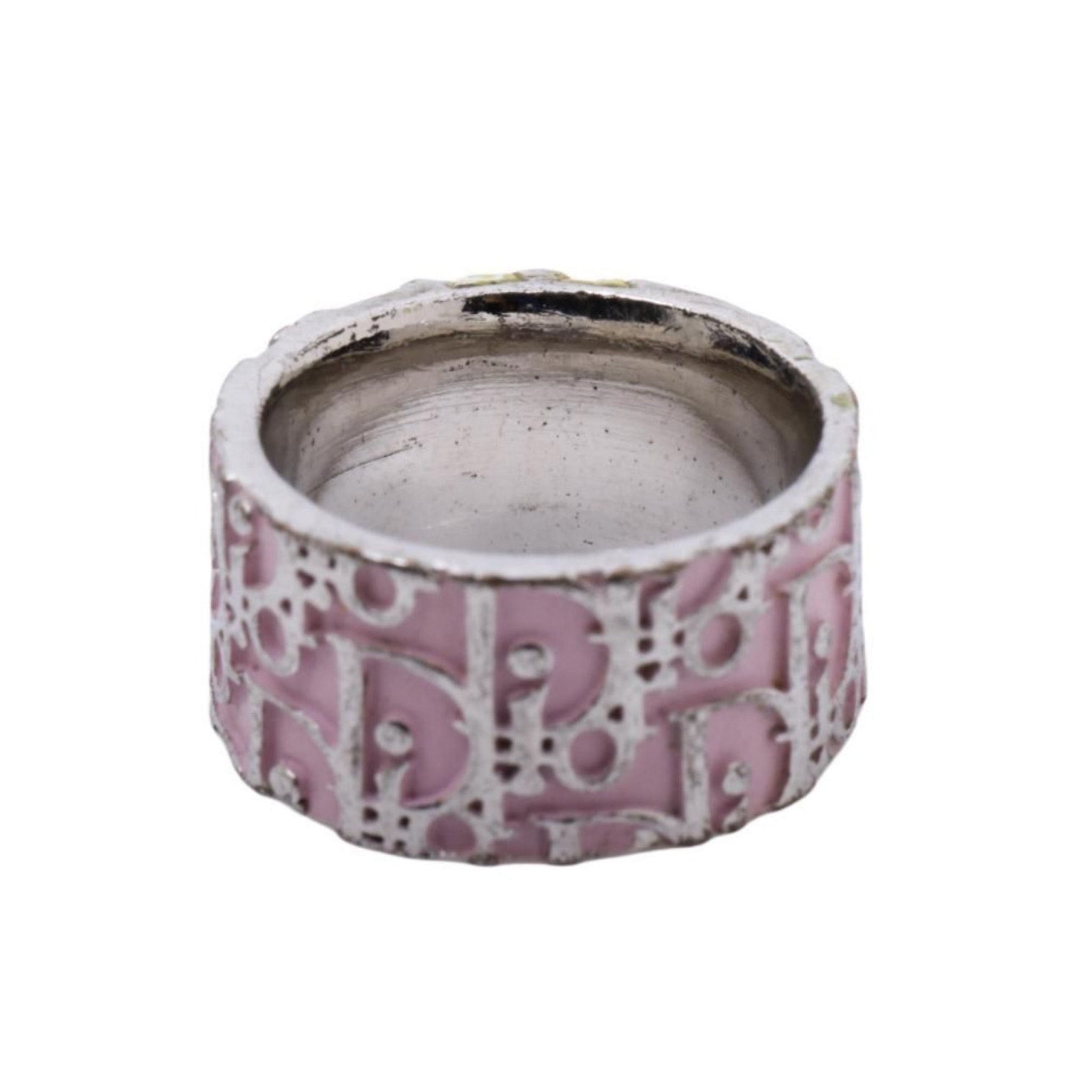 Decorative pink and white ceramic planter on a white background