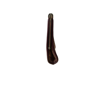 Brown leather case with a metal clip on a white background