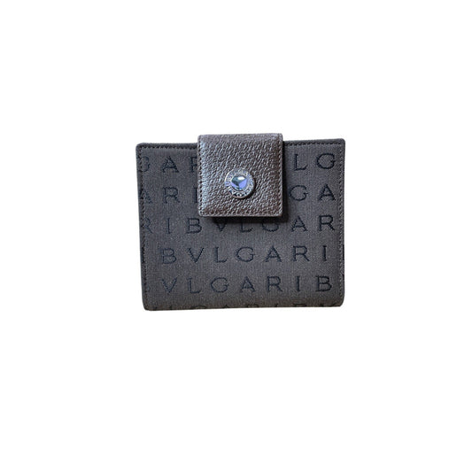 Bulgari wallet with a decorative clasp on a white background