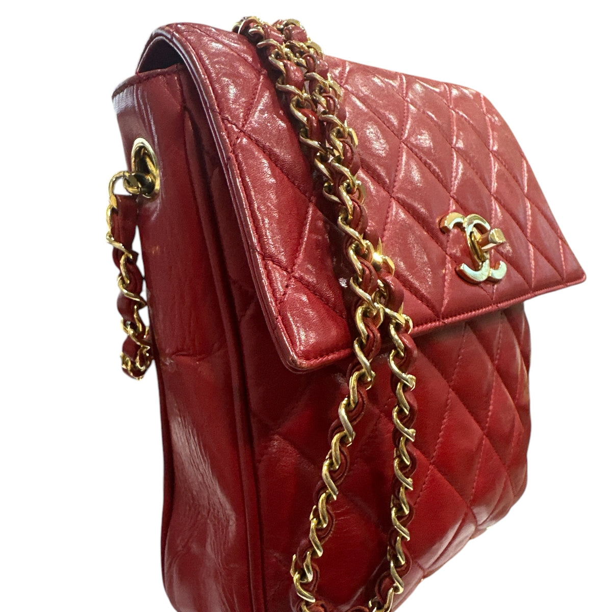 CHANEL 
Lambskin Quilted Flap Crossbody Red
