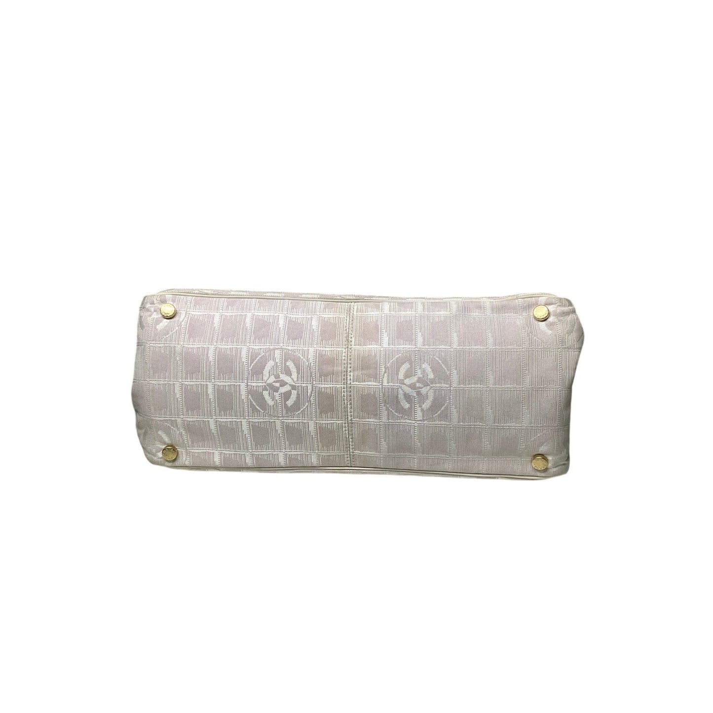 White textured handbag with gold accents on a white background
