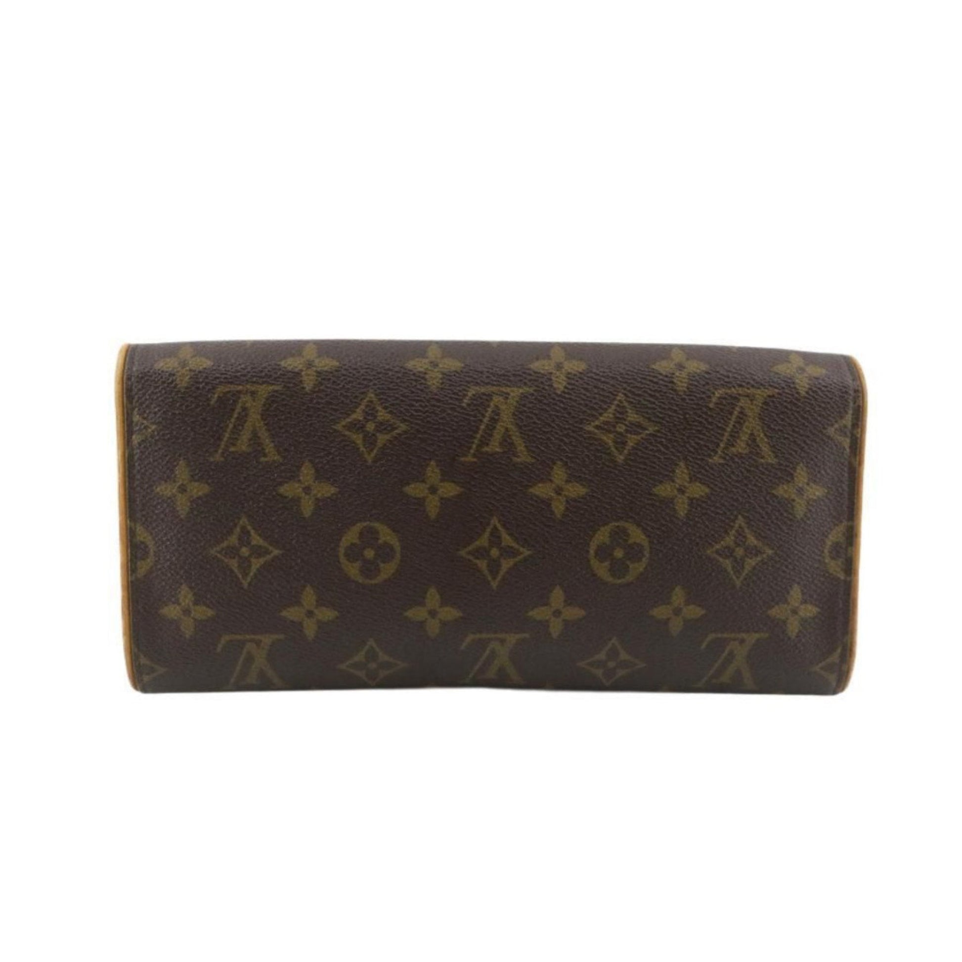 Brown wallet with gold monogram pattern on a white background