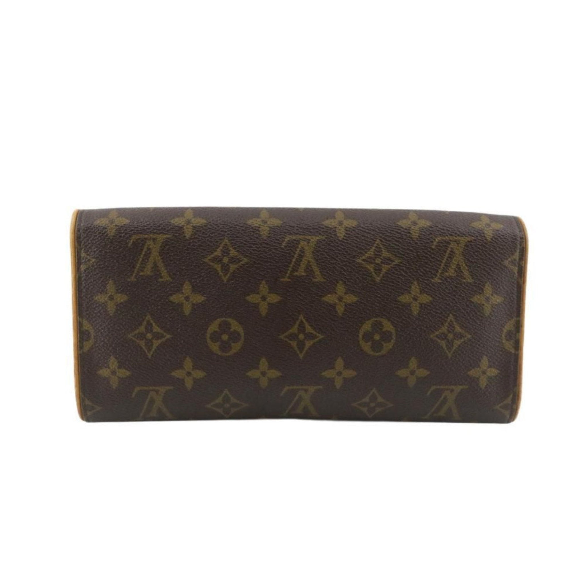 Brown wallet with gold monogram pattern on a white background