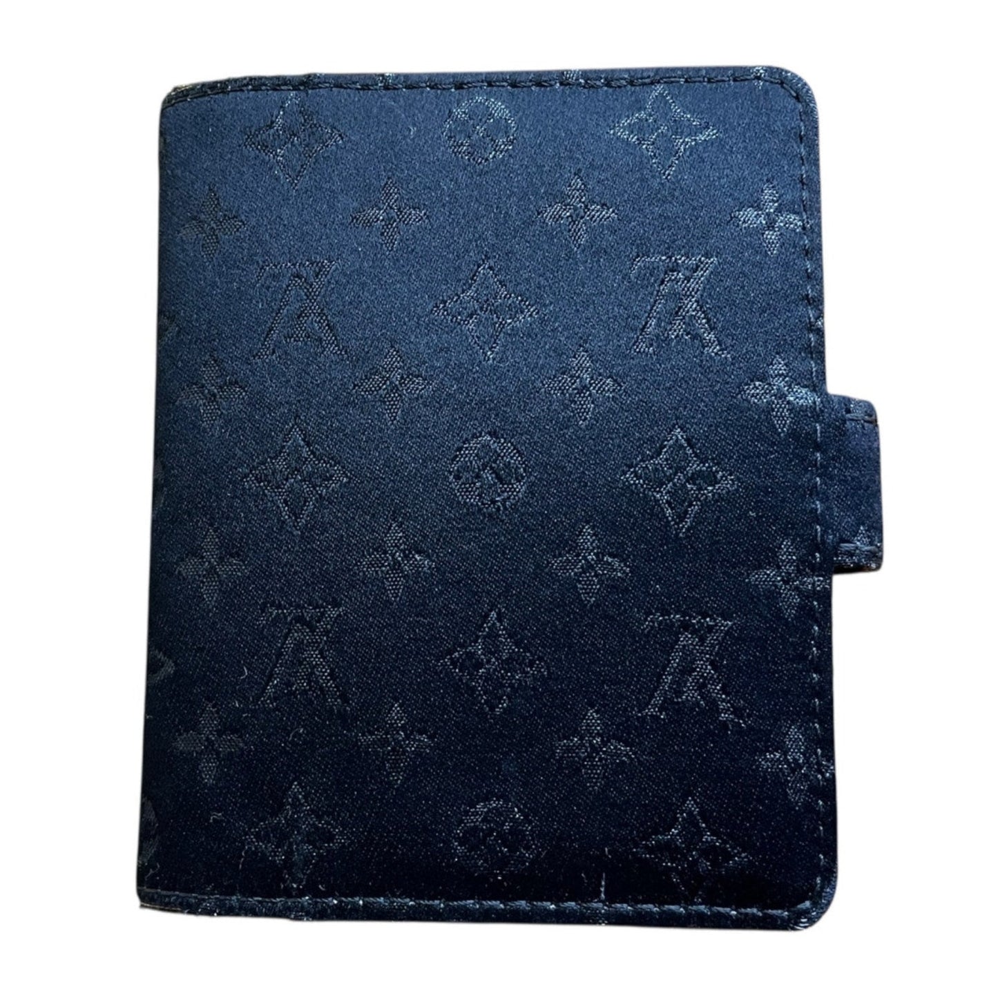 Blue wallet with monogram pattern on a white background
