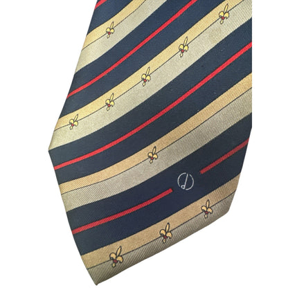 Striped tie with red, beige, and navy pattern on a white background