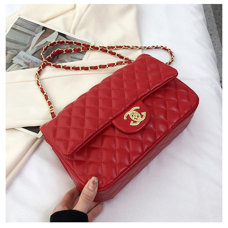 Red Chanel style bag