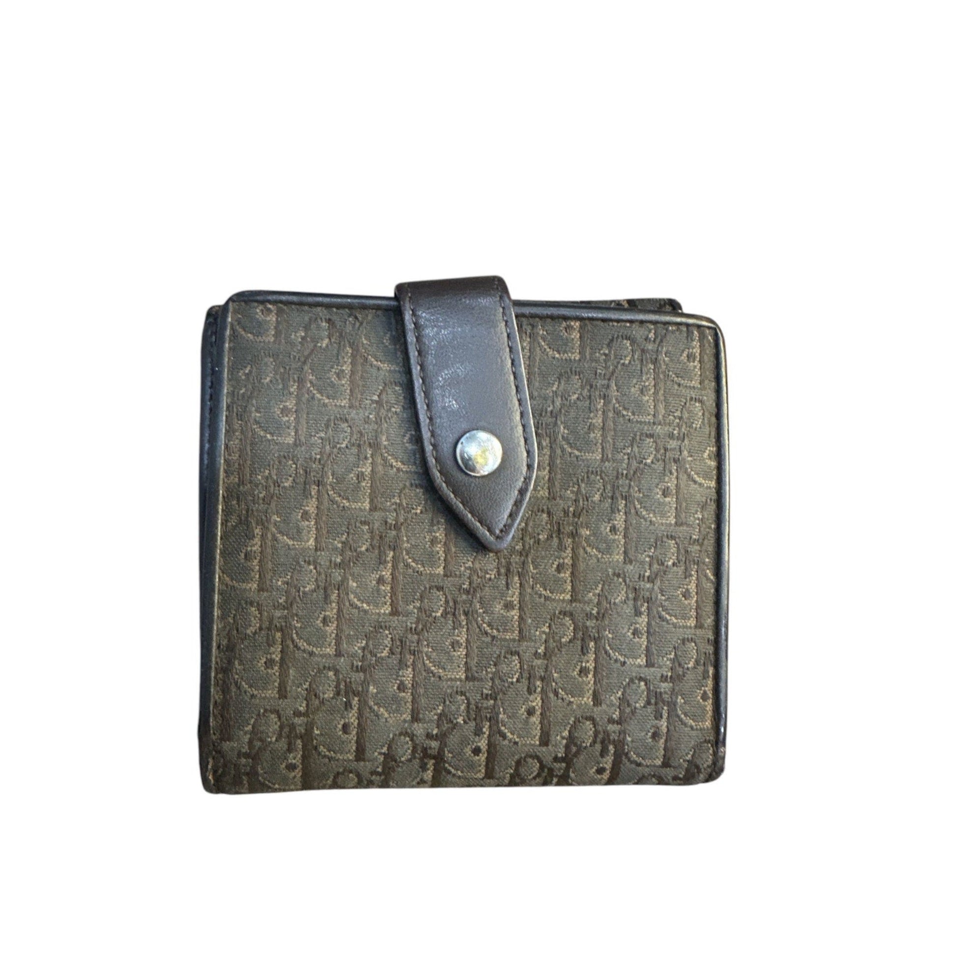 Patterned wallet with a leather strap on a white background