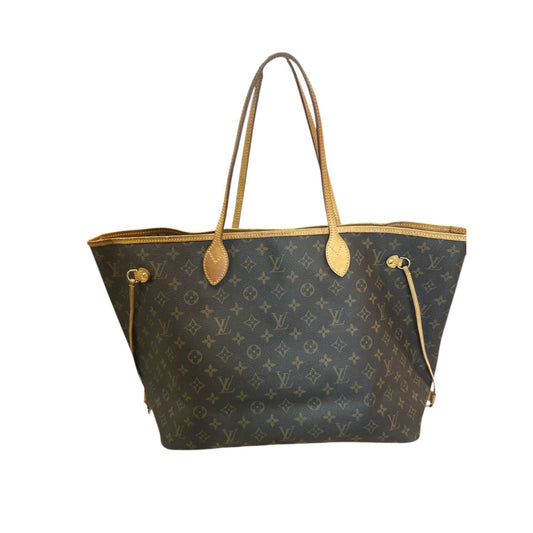 Designer handbag with monogram pattern on a white background