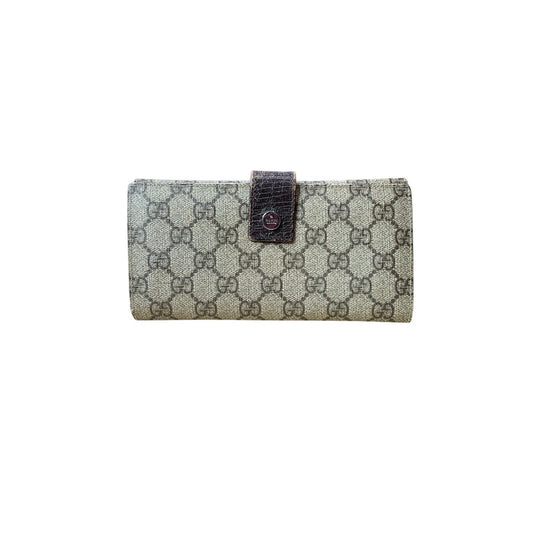 Designer wallet with patterned design on a white background