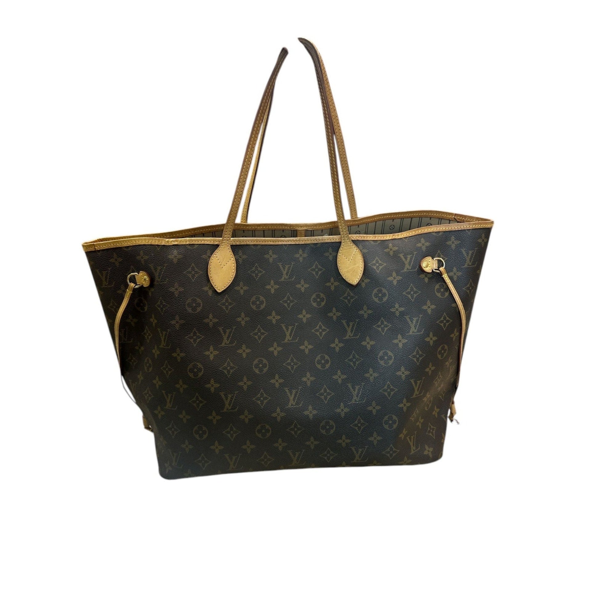 Designer handbag with monogram pattern on a white background