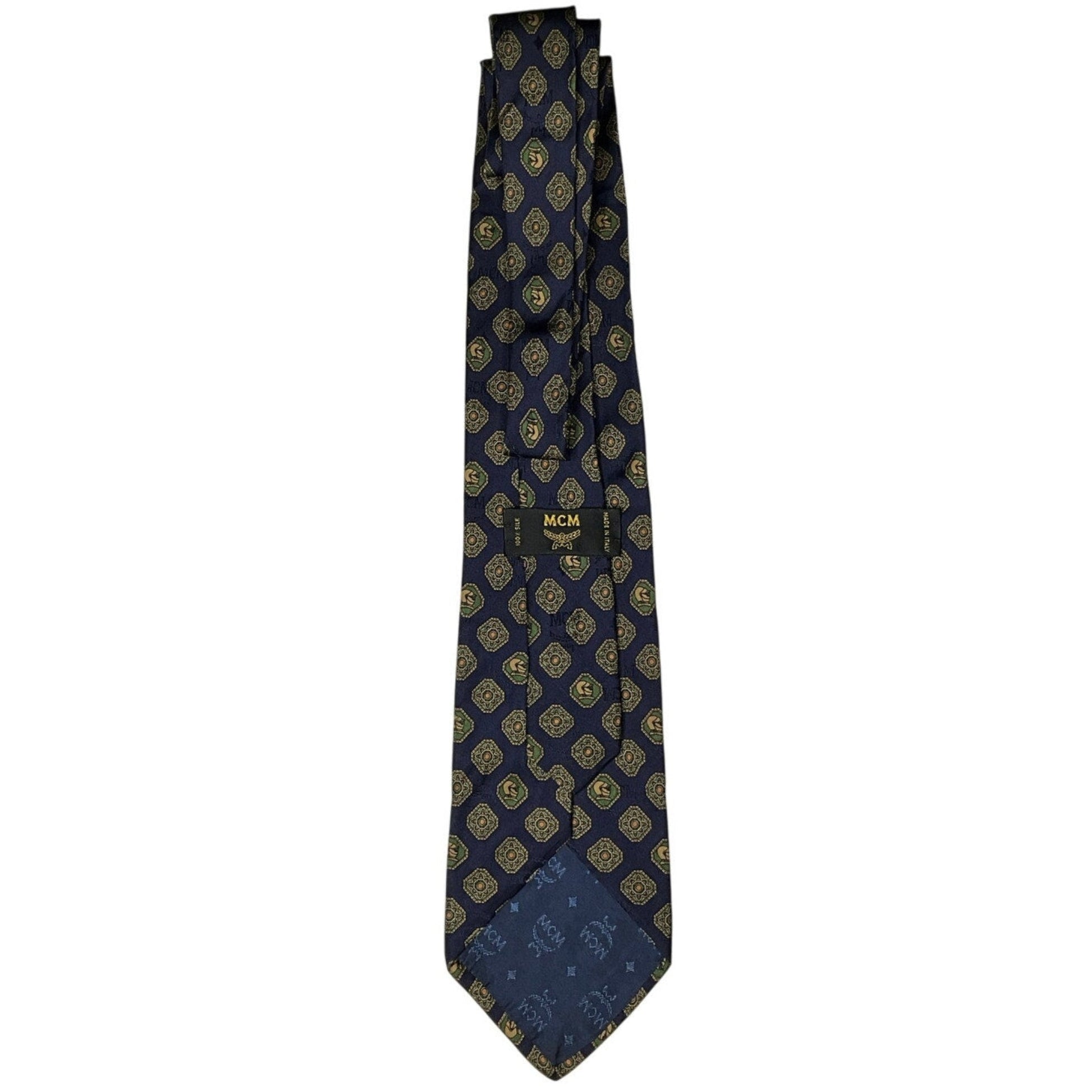 Navy blue tie with gold patterns on a white background