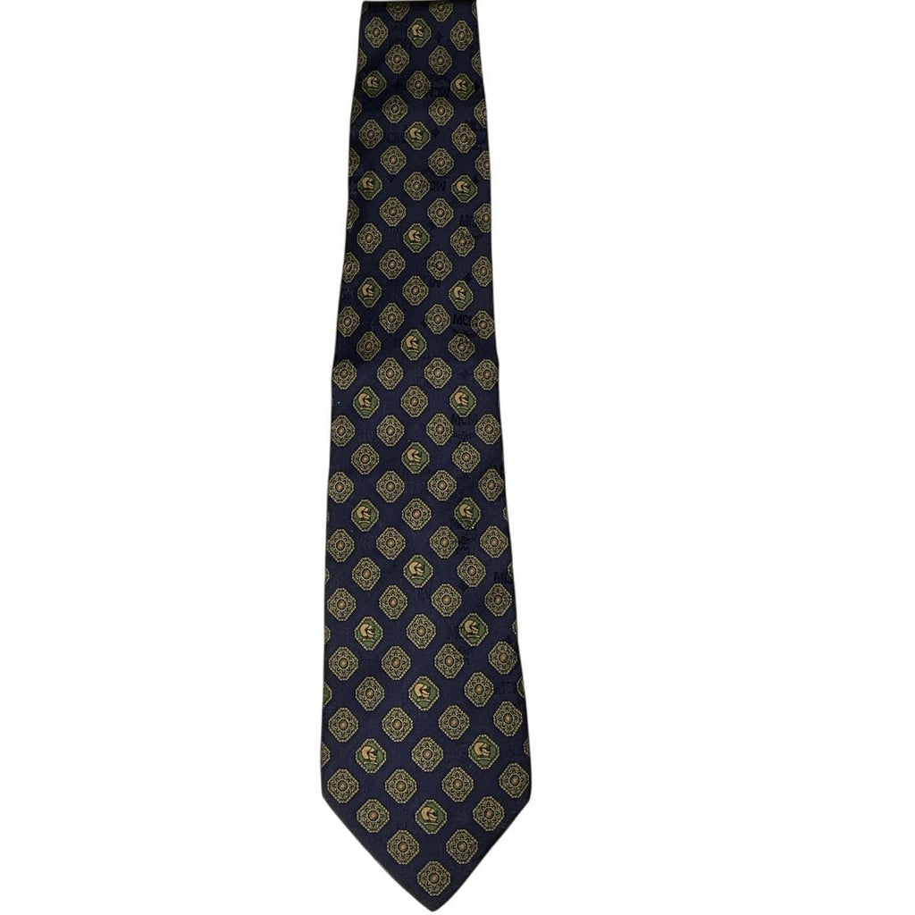 Navy blue tie with gold geometric pattern on a white background