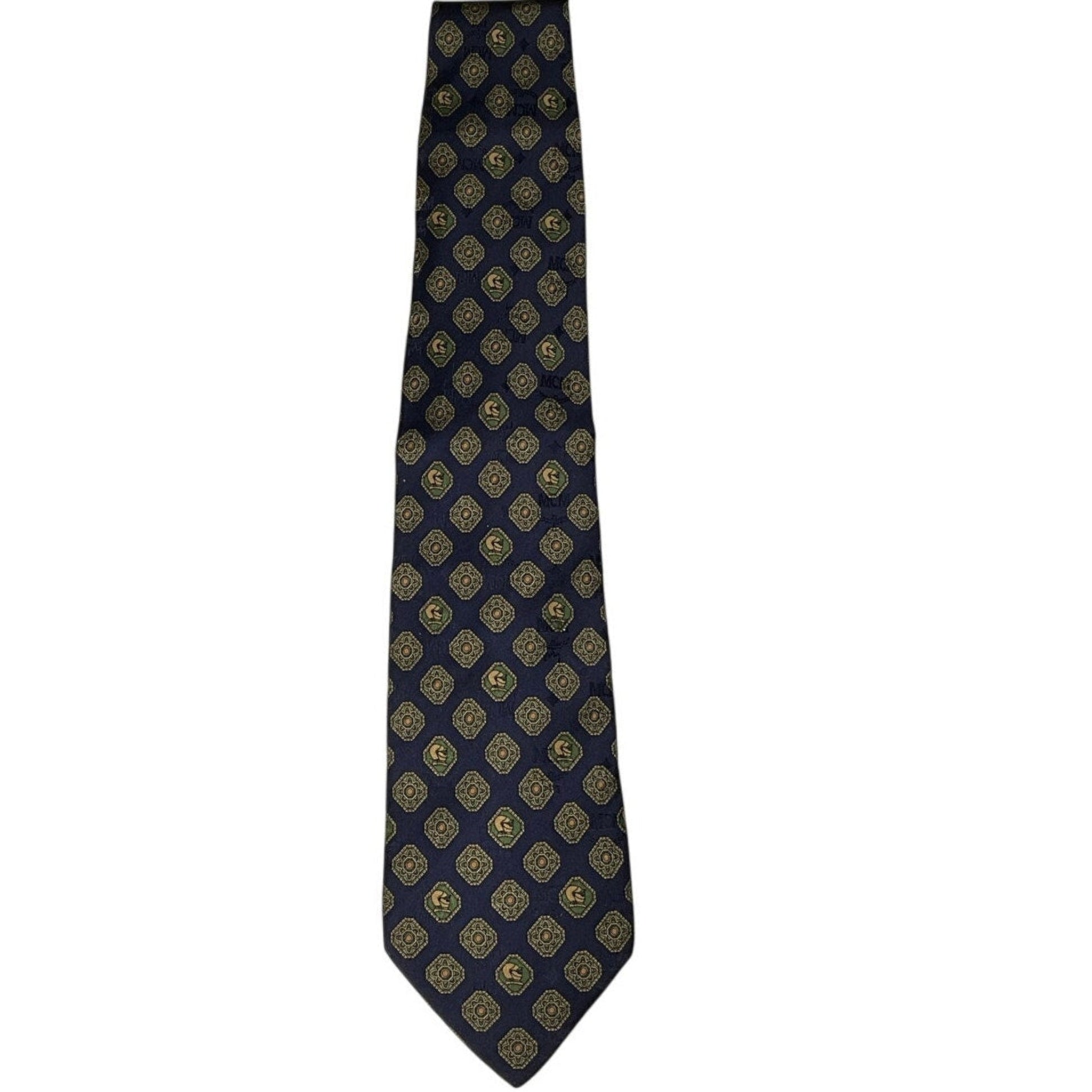 Navy blue tie with gold geometric pattern on a white background
