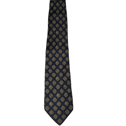 Navy blue tie with gold geometric pattern on a white background