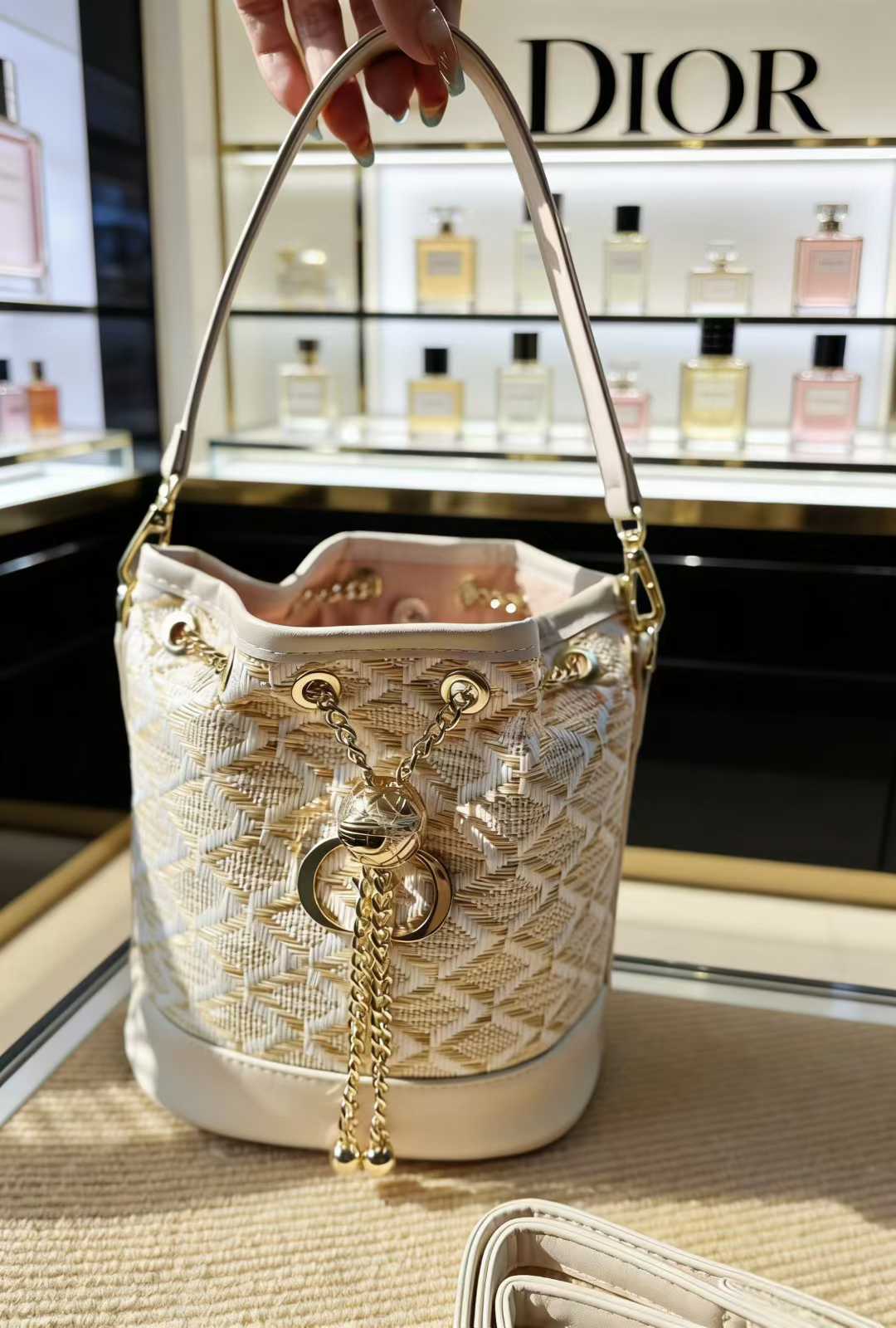 Woven Leather Bucket Bag with Chain Detail