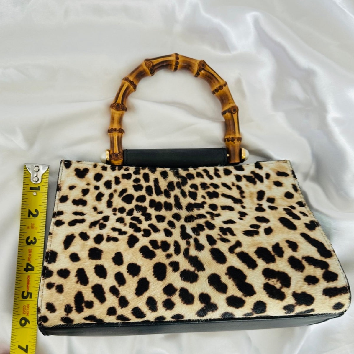 Authentic Gucci Nymphaea Leopard Calf Hair
Bag w/Bamboo Pearl Handles - Clairely Amazing